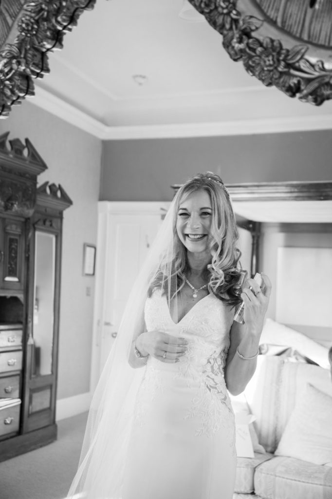 bride getting ready during bridal prep photos at raemoir house aberdeenshire weddings